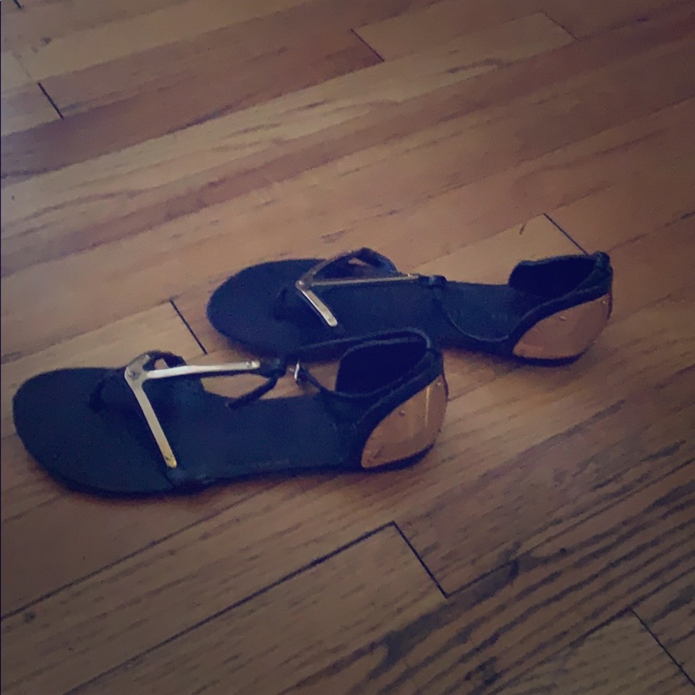 Black and gold sandals